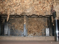 convoyeur-a-raclettes-a-la-sortie-dun-silo-de-chaufferie-a-bois-dechiquete-photo-©-frederic-douard-www.bioenergie.promotion.fr