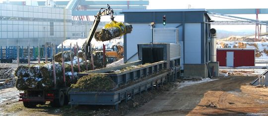 Broyage de fagots en Finlande sur une ligne Saalasti, photo Saalasti